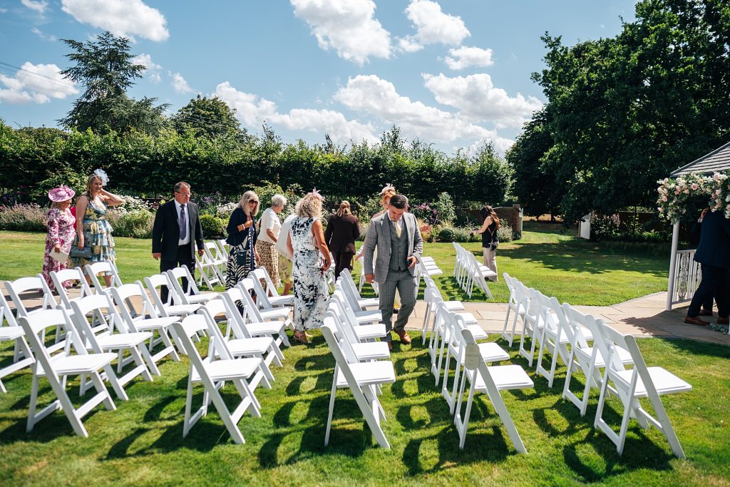 Summer wedding outdoors at Vaulty Manor Essex documentary wedding photographer