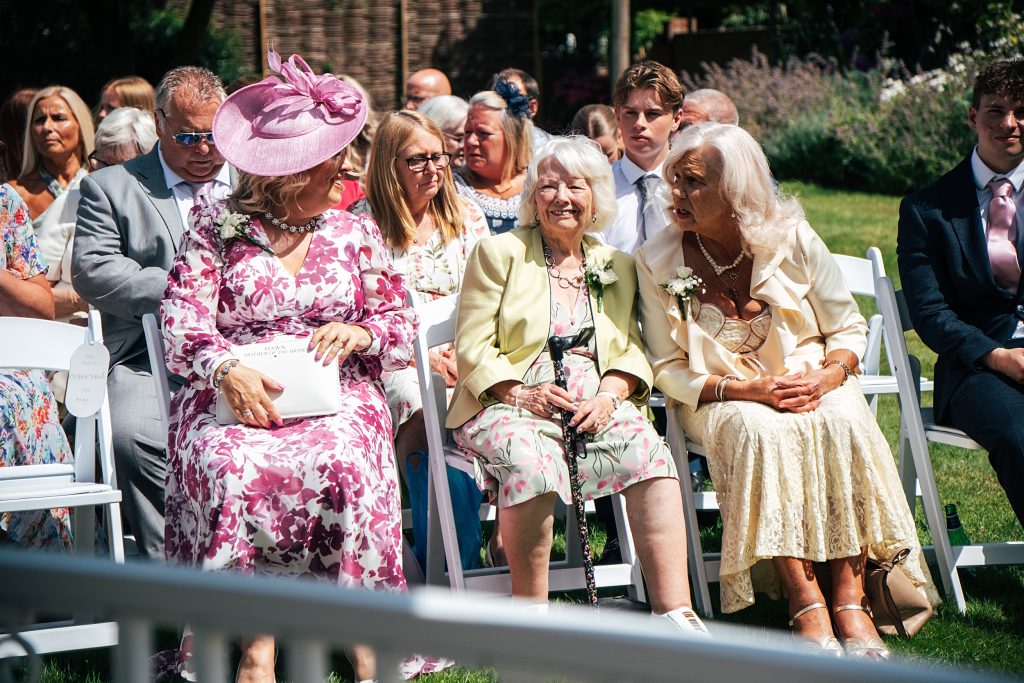 Summer wedding outdoors at Vaulty Manor Essex documentary wedding photographer