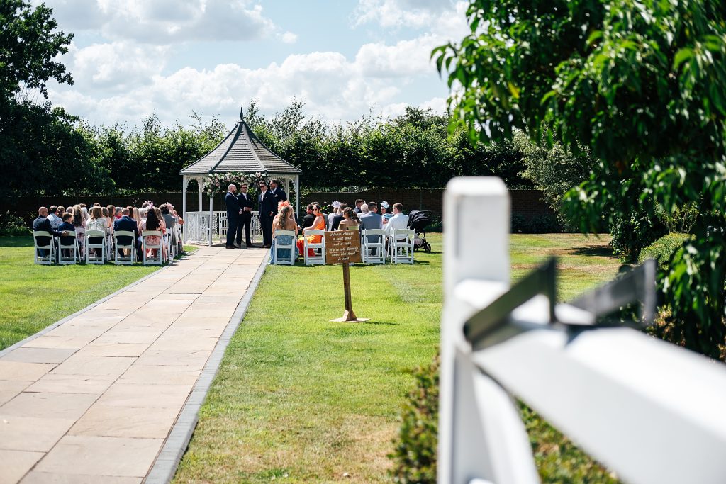 Summer wedding outdoors at Vaulty Manor Essex documentary wedding photographer