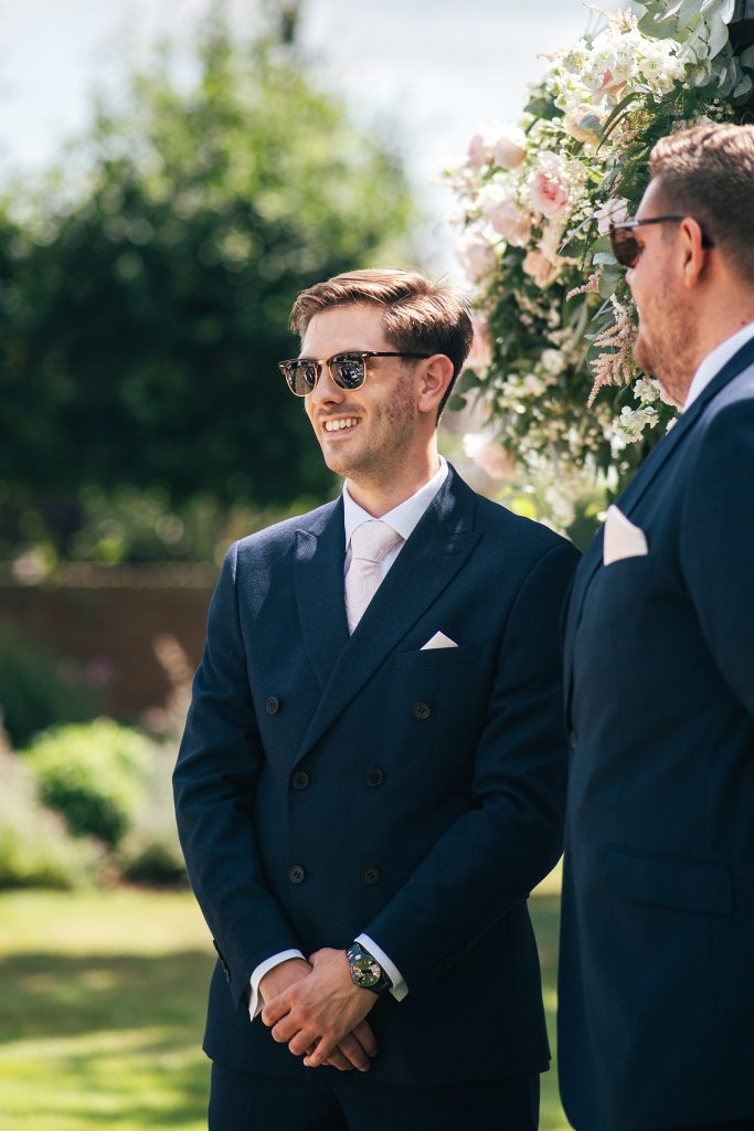 Summer wedding outdoors at Vaulty Manor Essex documentary wedding photographer