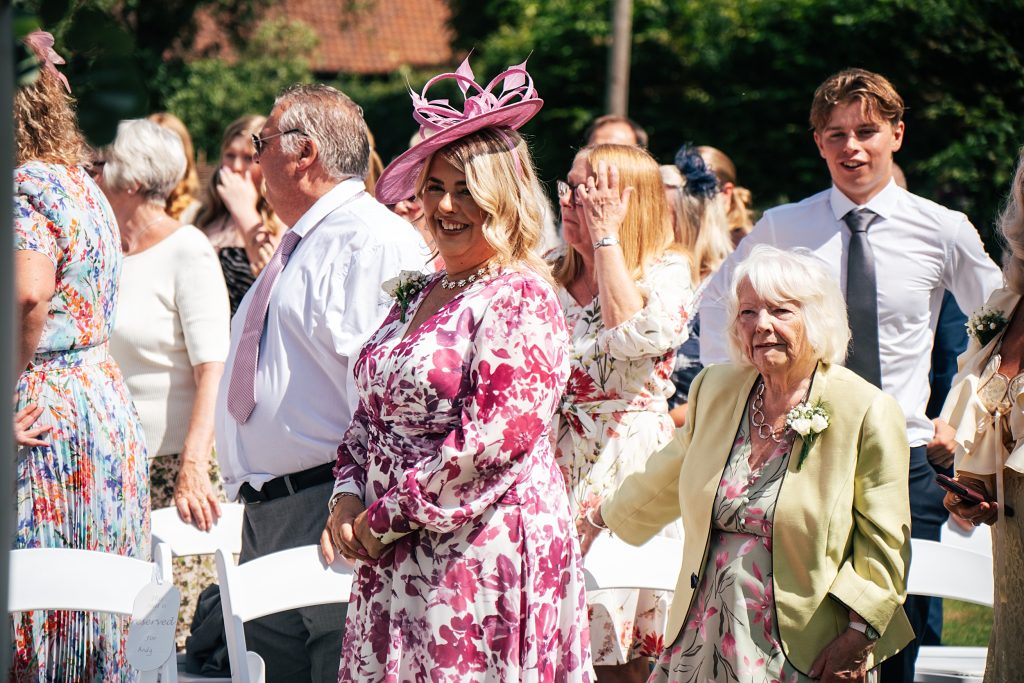 Summer wedding outdoors at Vaulty Manor Essex documentary wedding photographer