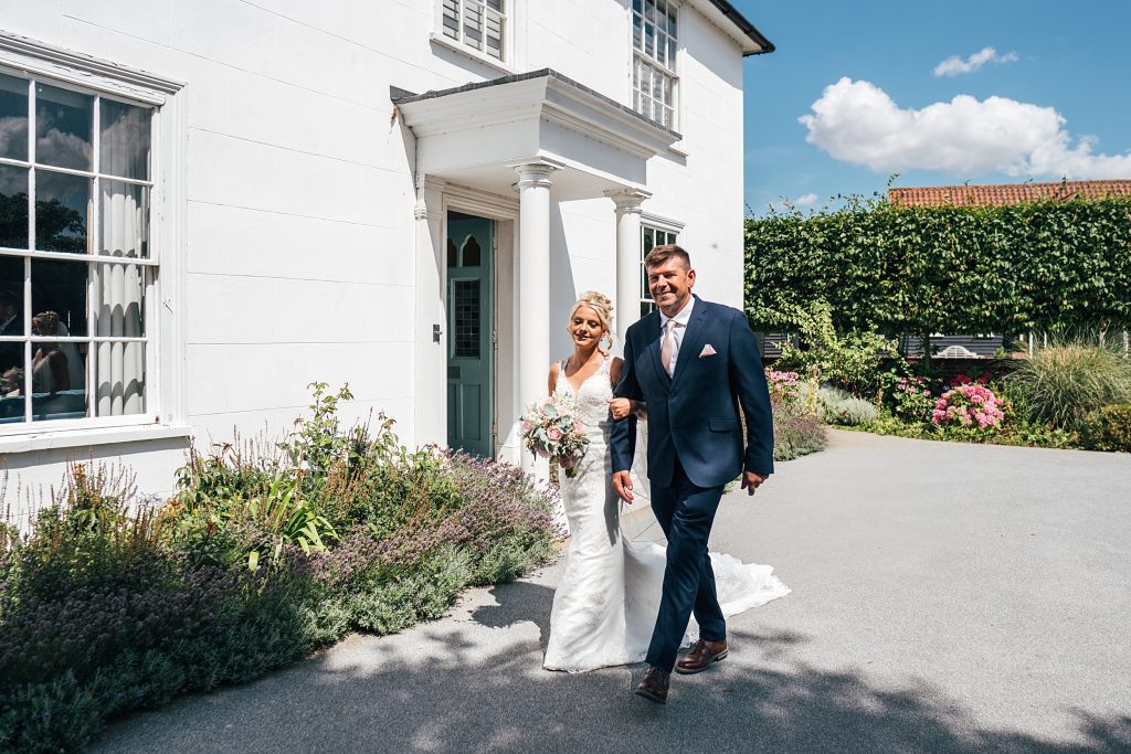 Summer wedding outdoors at Vaulty Manor Essex documentary wedding photographer