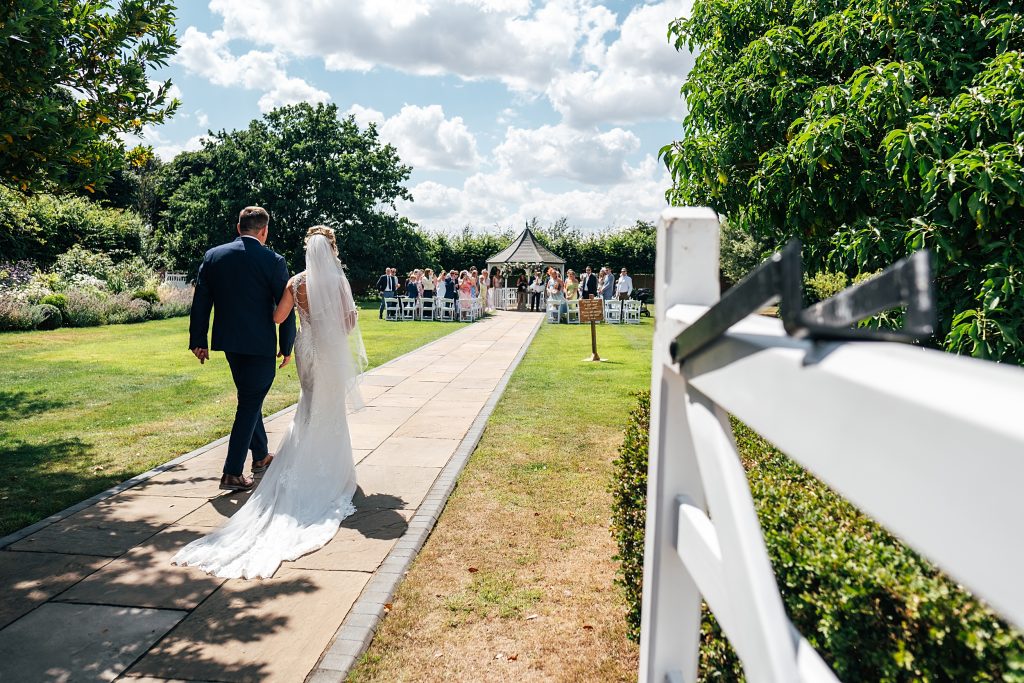 Summer wedding outdoors at Vaulty Manor Essex documentary wedding photographer