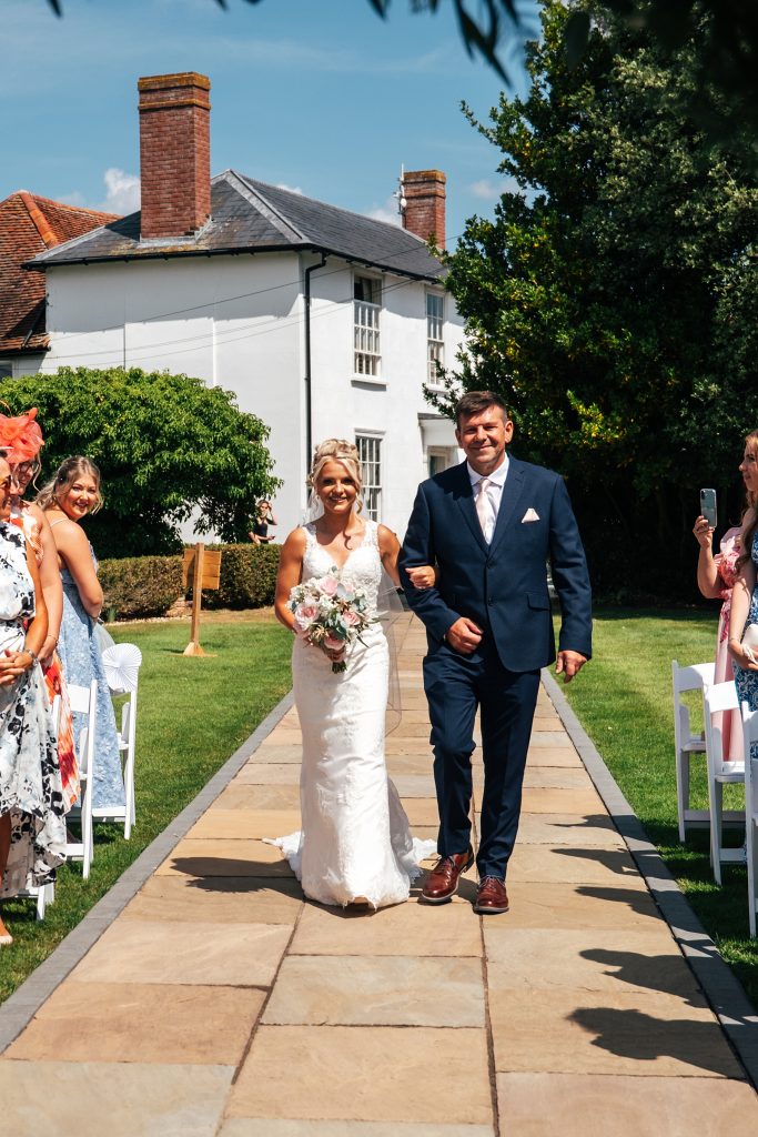 Summer wedding outdoors at Vaulty Manor Essex documentary wedding photographer