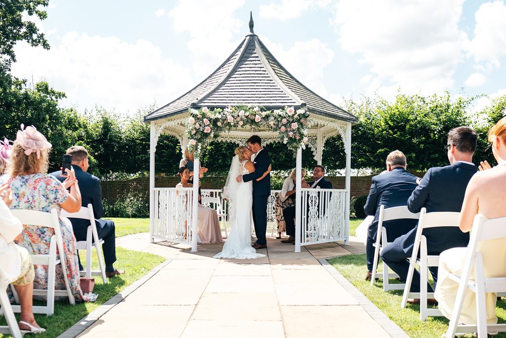Summer wedding outdoors at Vaulty Manor Essex documentary wedding photographer