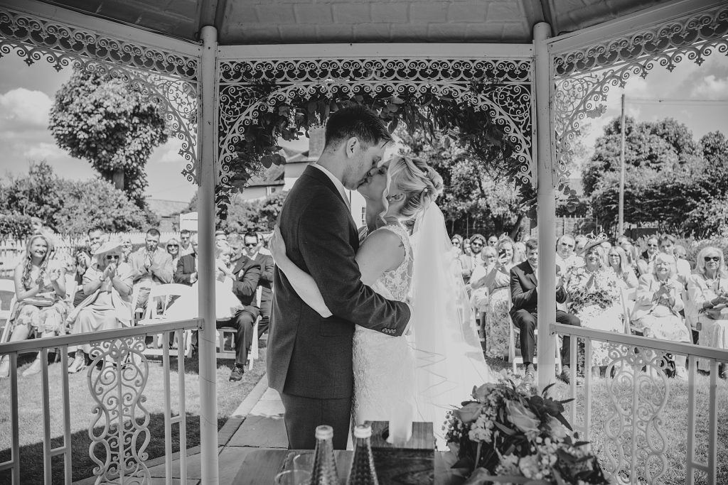 Summer wedding outdoors at Vaulty Manor Essex documentary wedding photographer