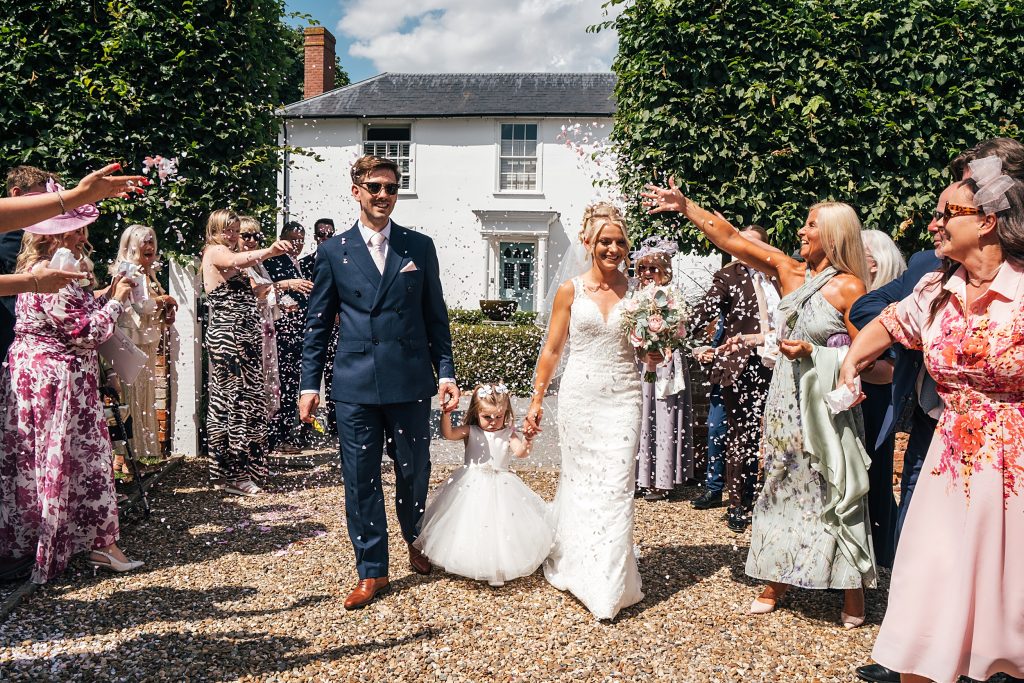 Summer wedding outdoors at Vaulty Manor Essex documentary wedding photographer