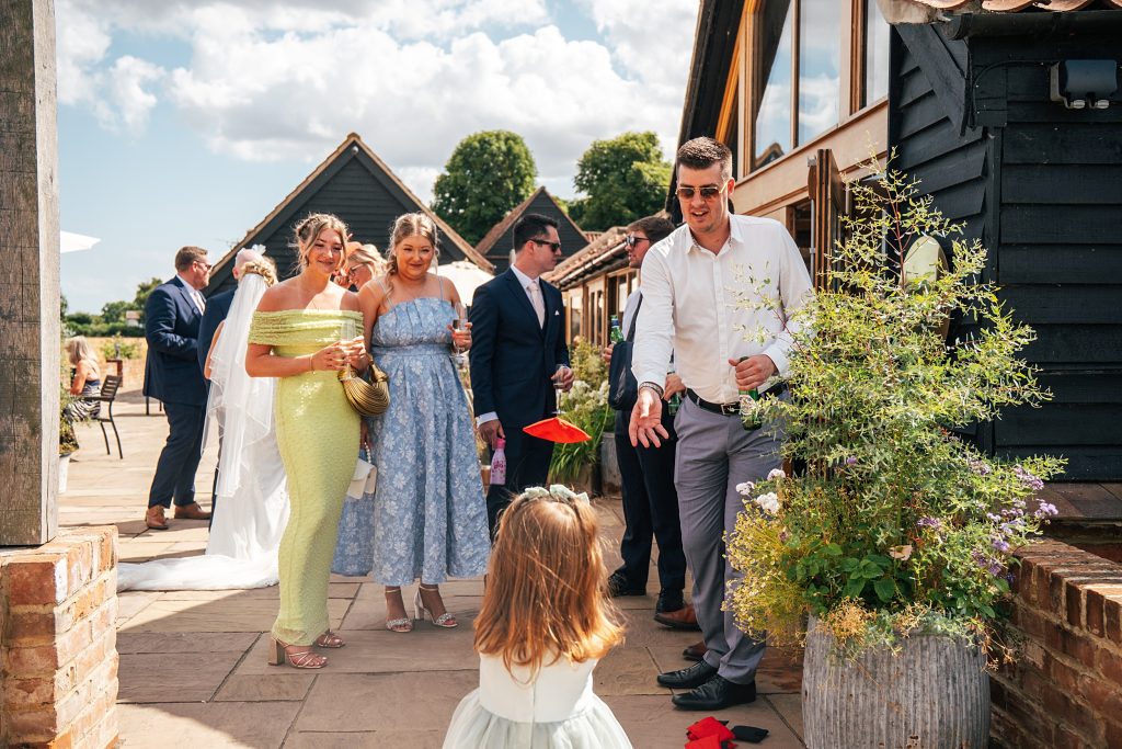 Summer wedding outdoors at Vaulty Manor Essex documentary wedding photographer