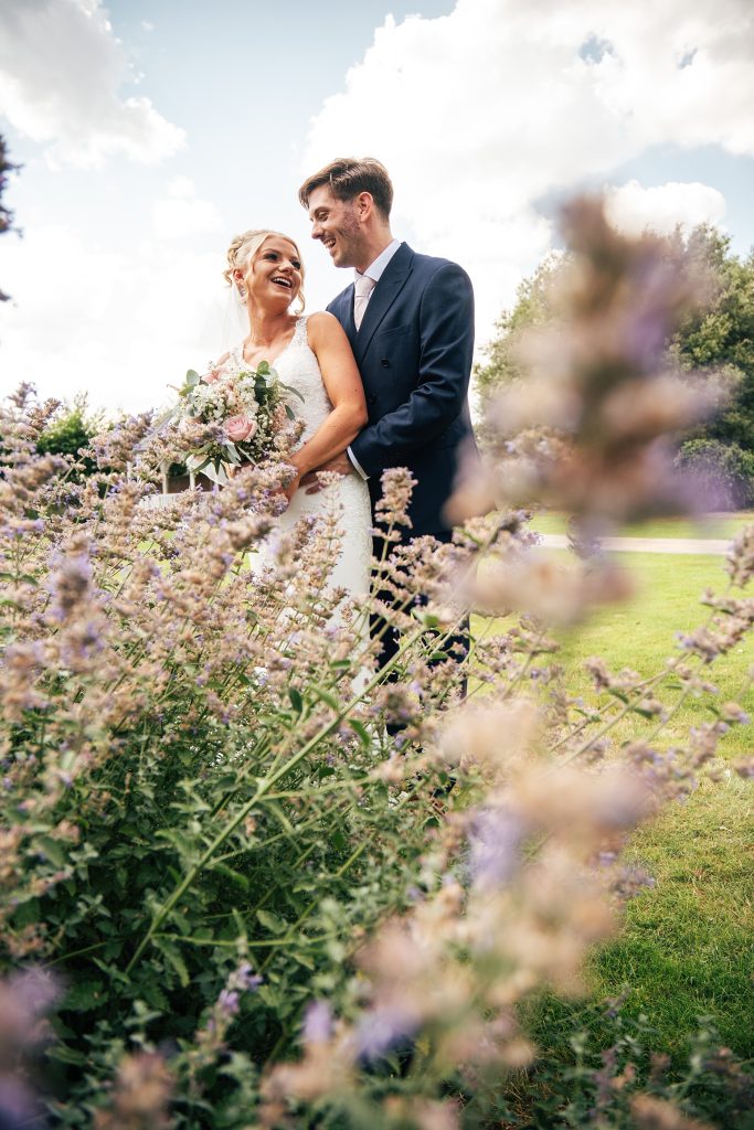 Summer wedding outdoors at Vaulty Manor Essex documentary wedding photographer