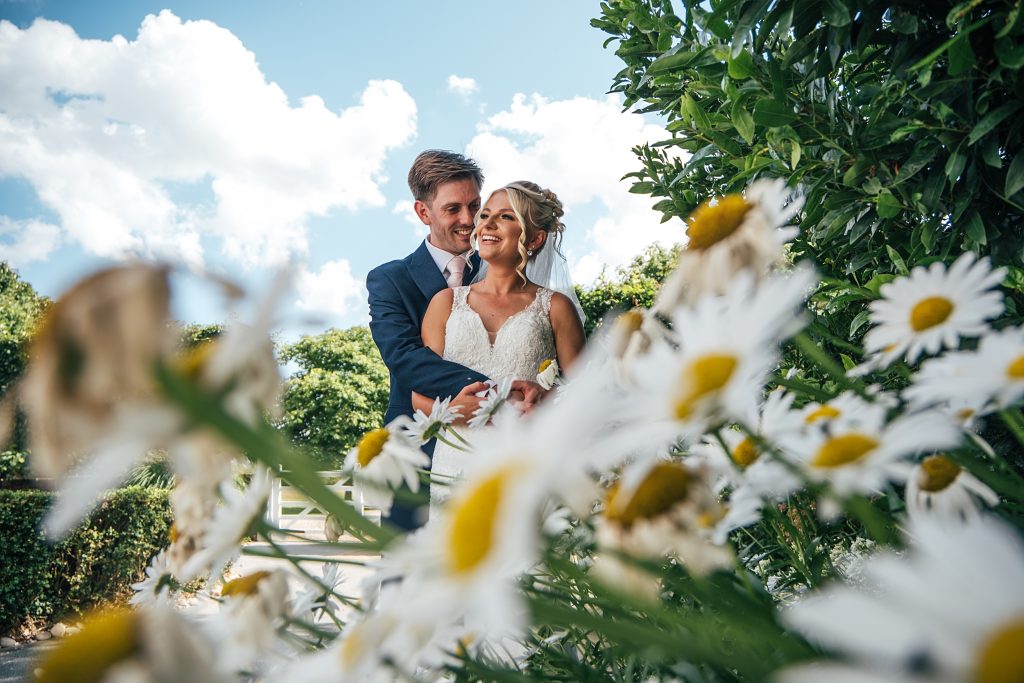 Summer wedding outdoors at Vaulty Manor Essex documentary wedding photographer