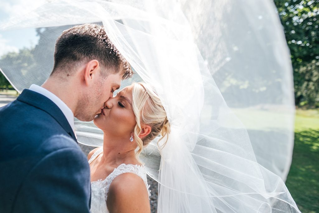 Summer wedding outdoors at Vaulty Manor Essex documentary wedding photographer