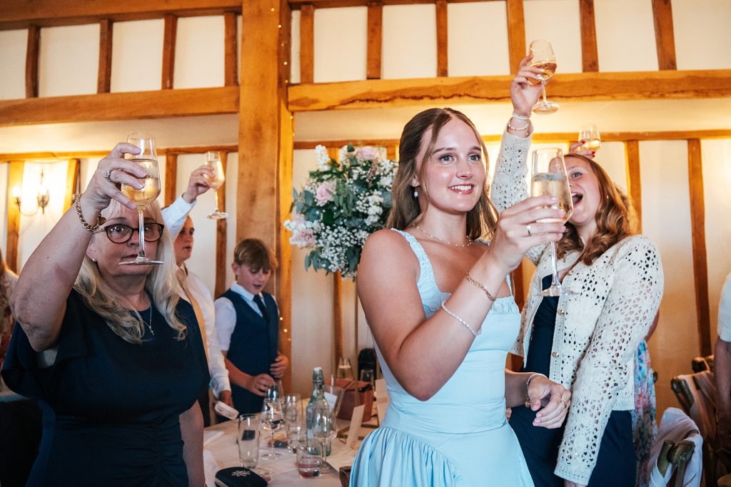 Summer wedding outdoors at Vaulty Manor Essex documentary wedding photographer