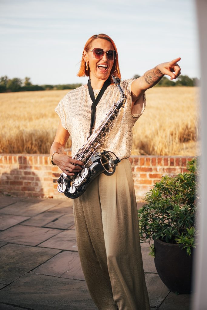 Summer wedding outdoors at Vaulty Manor Essex documentary wedding photographer