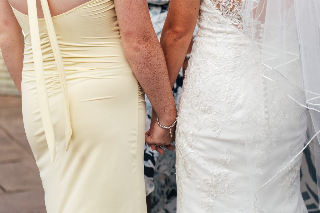 Summer wedding outdoors at Vaulty Manor Essex documentary wedding photographer