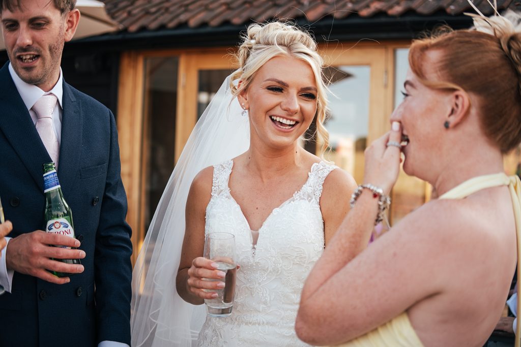 Summer wedding outdoors at Vaulty Manor Essex documentary wedding photographer