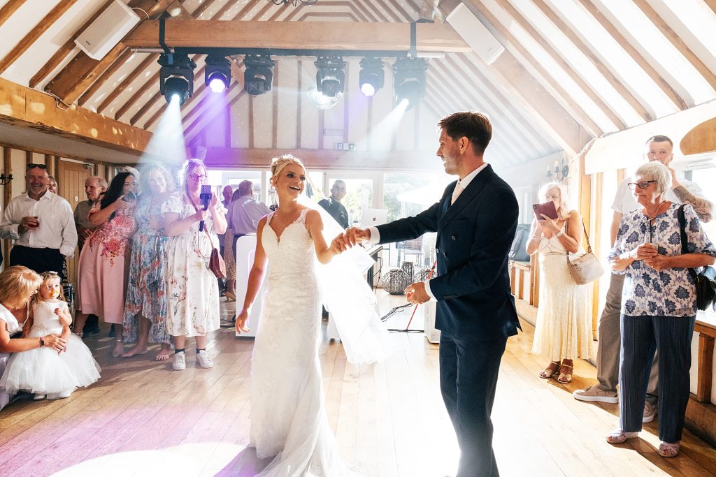 Summer wedding outdoors at Vaulty Manor Essex documentary wedding photographer