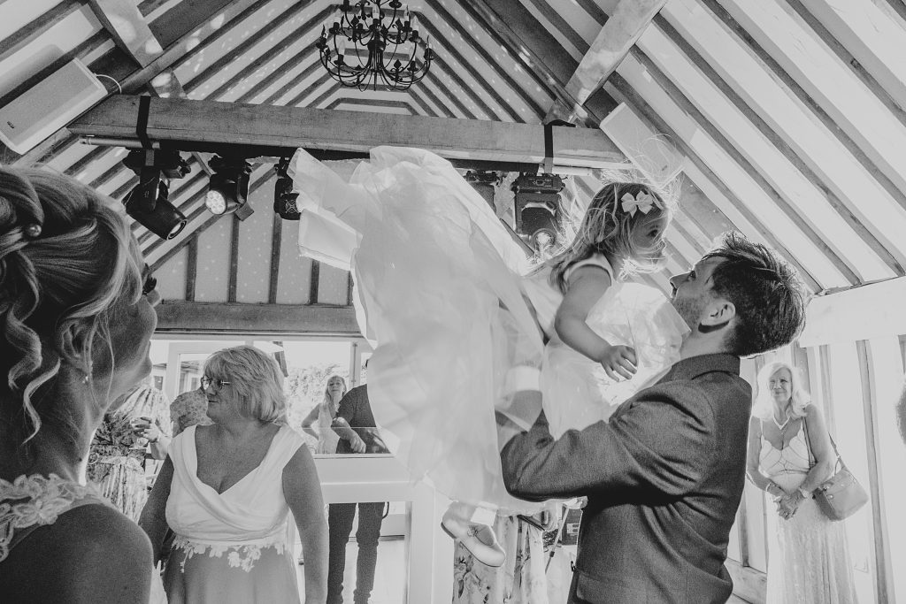 Summer wedding outdoors at Vaulty Manor Essex documentary wedding photographer