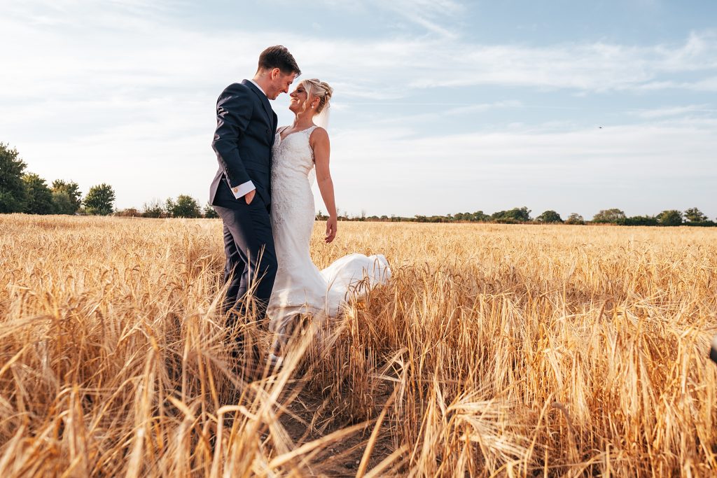 Summer wedding outdoors at Vaulty Manor Essex documentary wedding photographer