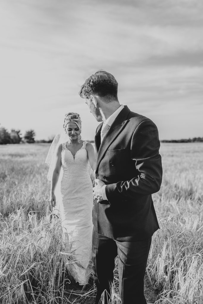 Summer wedding outdoors at Vaulty Manor Essex documentary wedding photographer