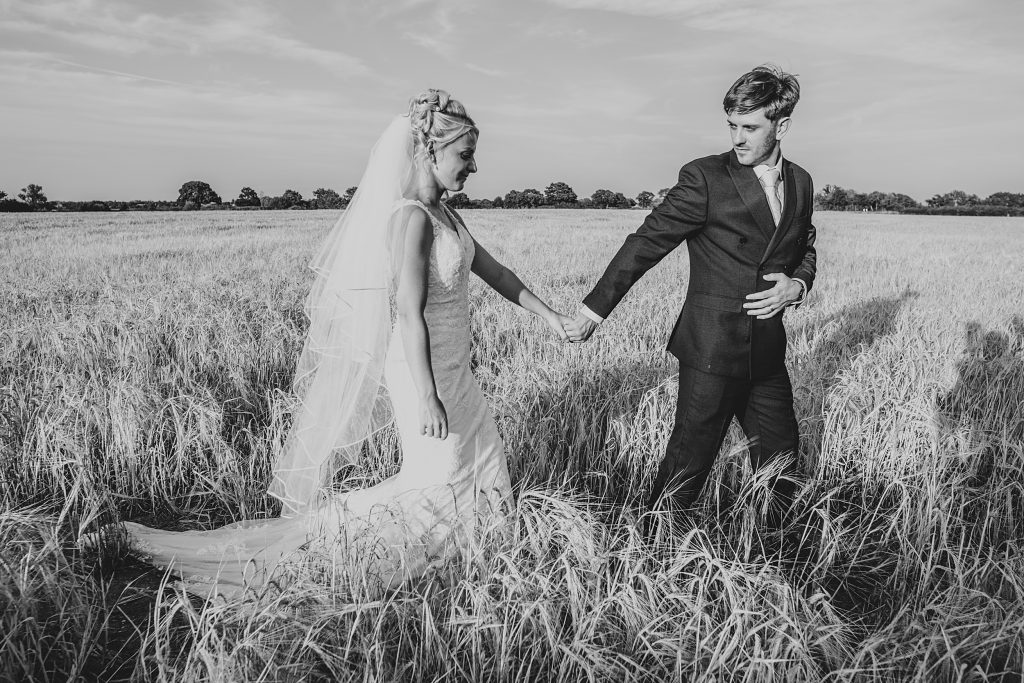 Summer wedding outdoors at Vaulty Manor Essex documentary wedding photographer