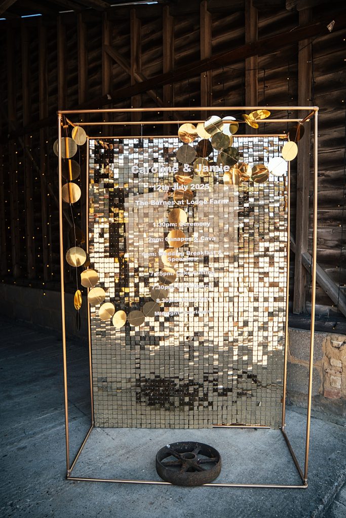 Multi coloured Summer wedding with a bride wearing green at The Barns at Lodge Farm. Essex documentary wedding photographer