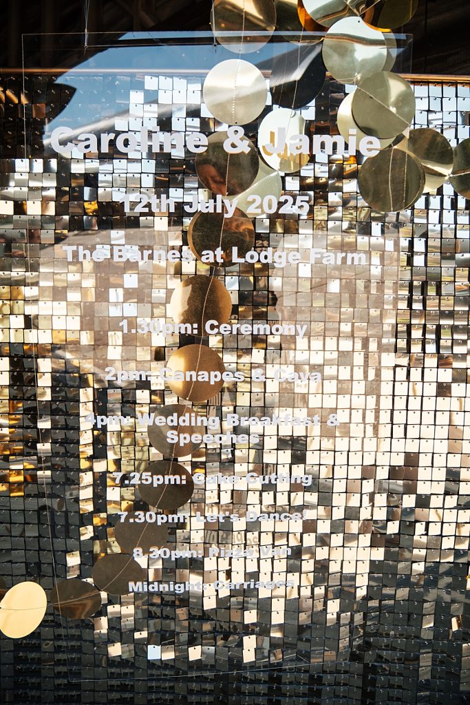 Multi coloured Summer wedding with a bride wearing green at The Barns at Lodge Farm. Essex documentary wedding photographer