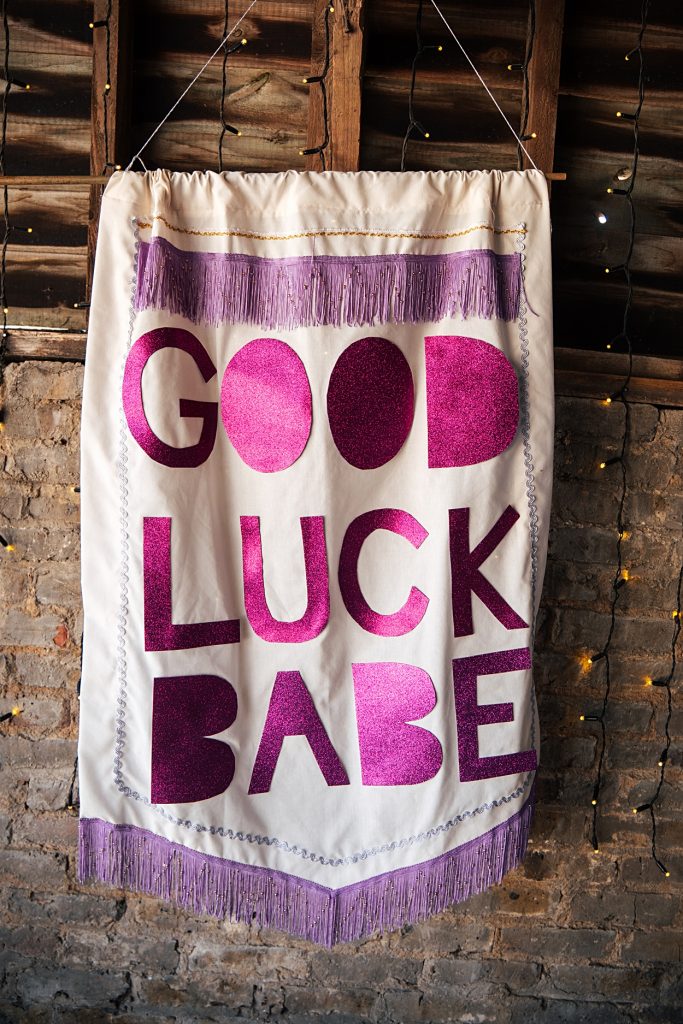 Multi coloured Summer wedding with a bride wearing green at The Barns at Lodge Farm. Essex documentary wedding photographer