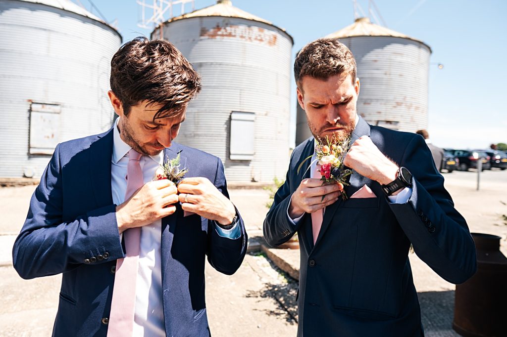 Multi coloured Summer wedding with a bride wearing green at The Barns at Lodge Farm. Essex documentary wedding photographer