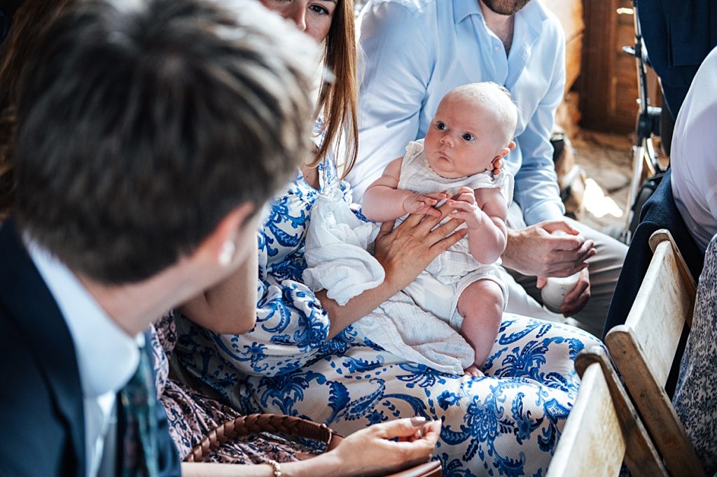 Multi coloured Summer wedding with a bride wearing green at The Barns at Lodge Farm. Essex documentary wedding photographer