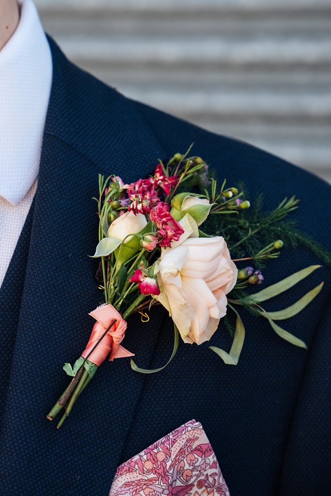 Multi coloured Summer wedding with a bride wearing green at The Barns at Lodge Farm. Essex documentary wedding photographer