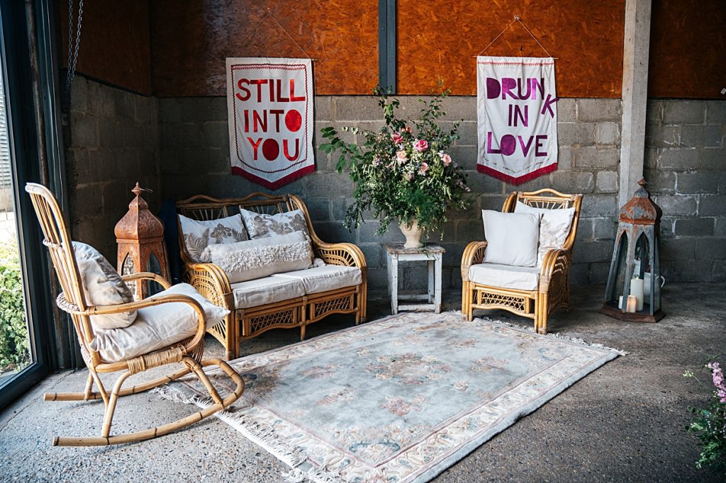 Multi coloured Summer wedding with a bride wearing green at The Barns at Lodge Farm. Essex documentary wedding photographer