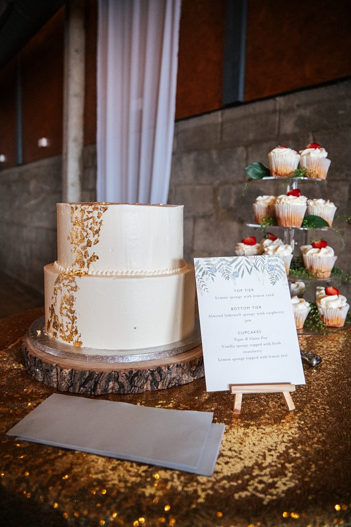 Multi coloured Summer wedding with a bride wearing green at The Barns at Lodge Farm. Essex documentary wedding photographer