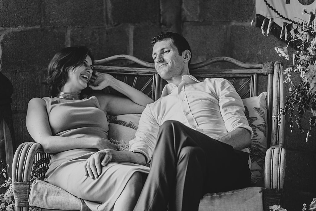 Multi coloured Summer wedding with a bride wearing green at The Barns at Lodge Farm. Essex documentary wedding photographer