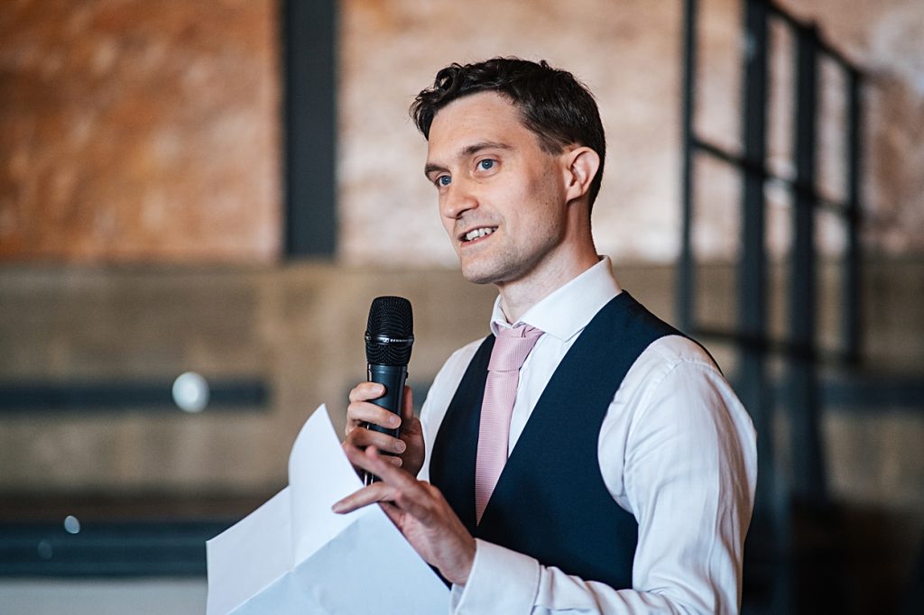 Multi coloured Summer wedding with a bride wearing green at The Barns at Lodge Farm. Essex documentary wedding photographer