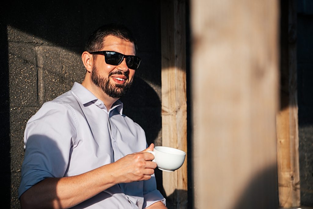 Multi coloured Summer wedding with a bride wearing green at The Barns at Lodge Farm. Essex documentary wedding photographer