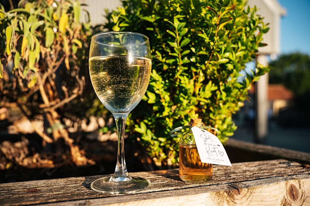 Multi coloured Summer wedding with a bride wearing green at The Barns at Lodge Farm. Essex documentary wedding photographer
