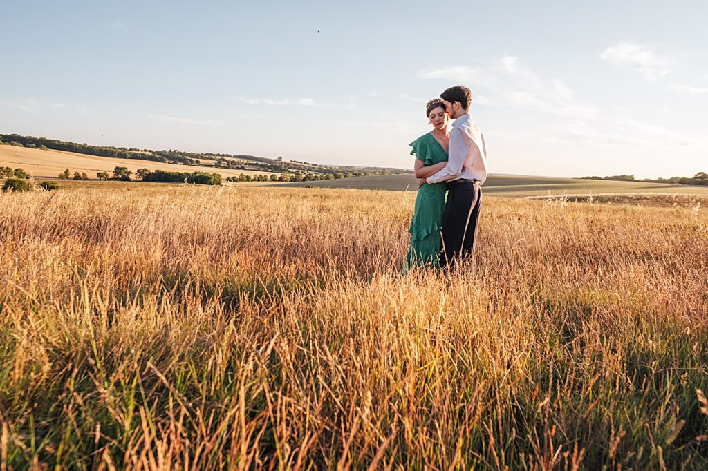 Multi coloured Summer wedding with a bride wearing green at The Barns at Lodge Farm. Essex documentary wedding photographer