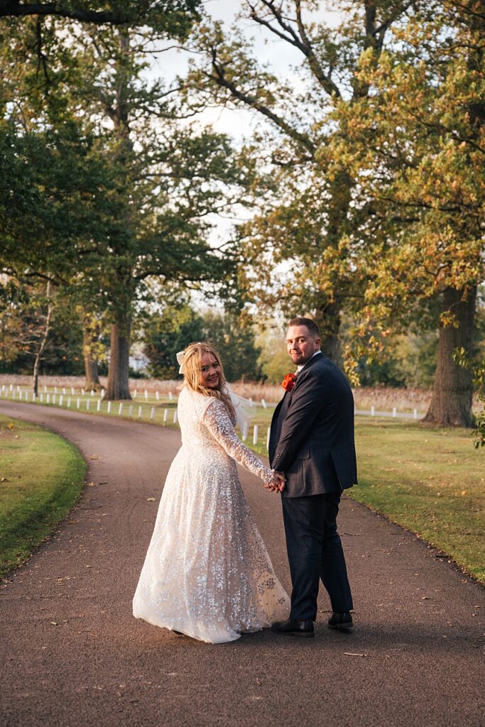 hot pink, orange and disco balls for autumn wedding at Blake Hall