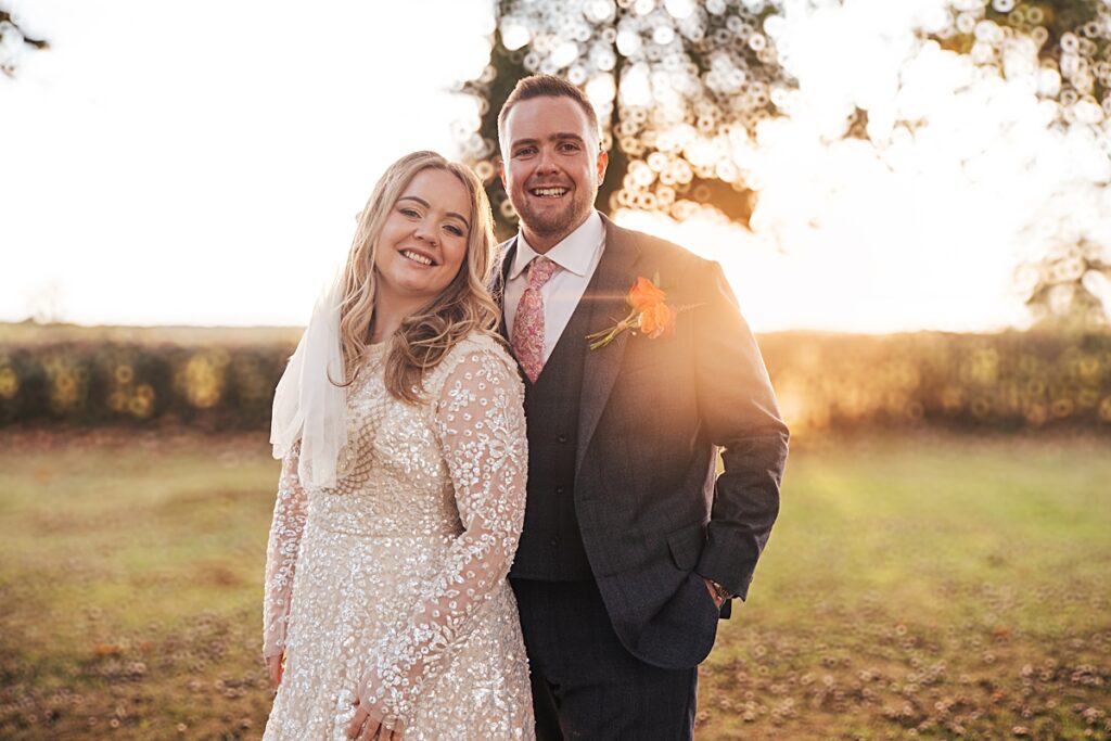 hot pink, orange and disco balls for autumn wedding at Blake Hall