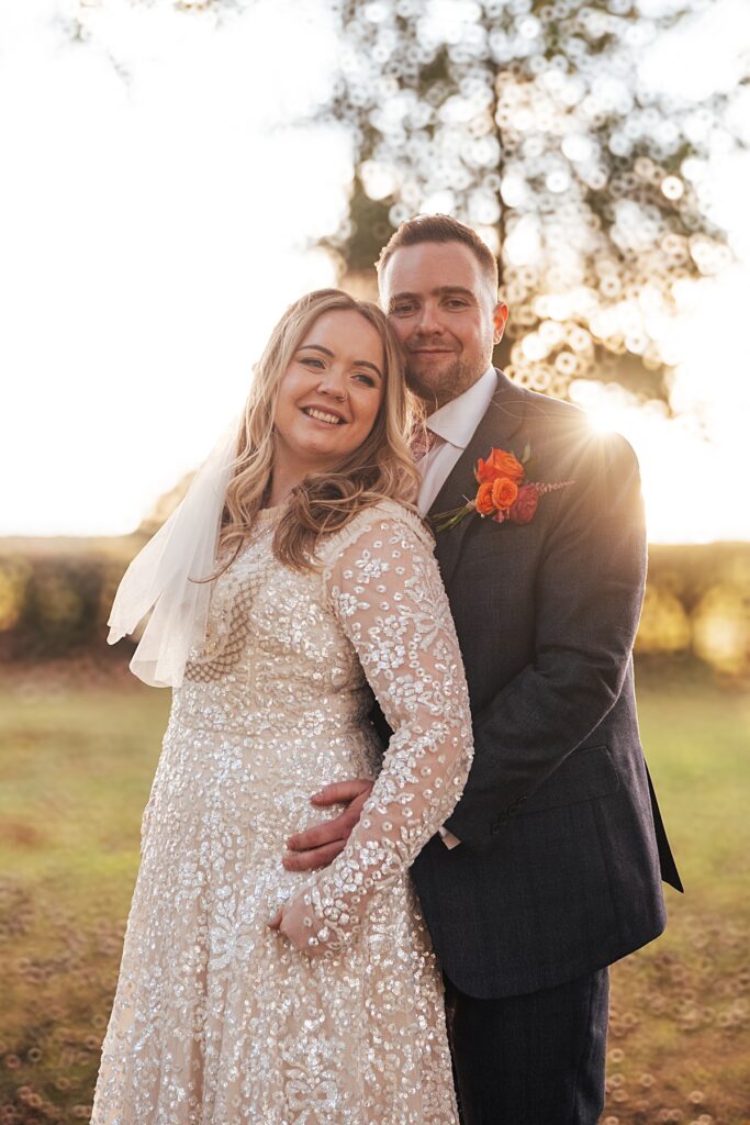 hot pink, orange and disco balls for autumn wedding at Blake Hall