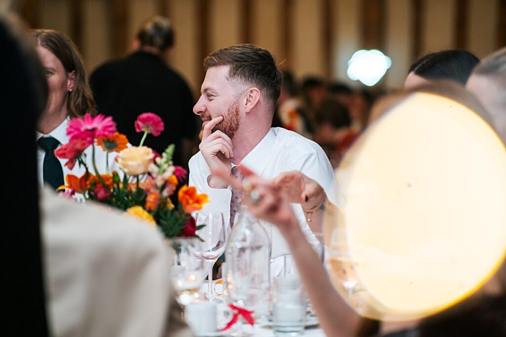 hot pink, orange and disco balls for autumn wedding at Blake Hall