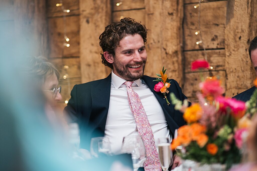 hot pink, orange and disco balls for autumn wedding at Blake Hall