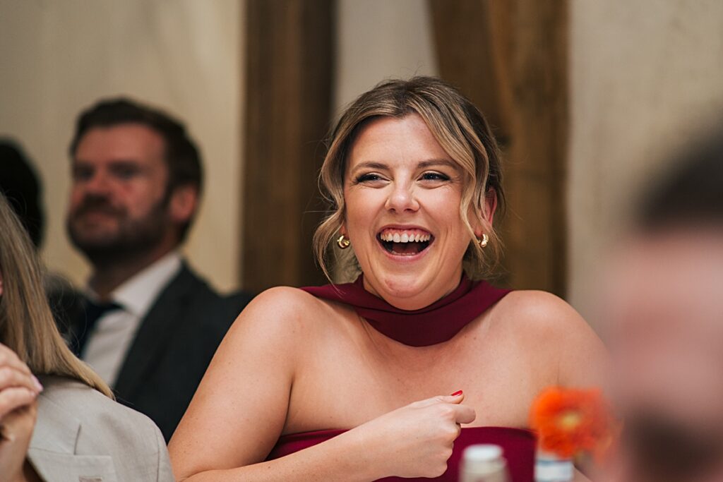 hot pink, orange and disco balls for autumn wedding at Blake Hall