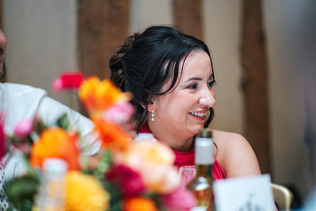 hot pink, orange and disco balls for autumn wedding at Blake Hall