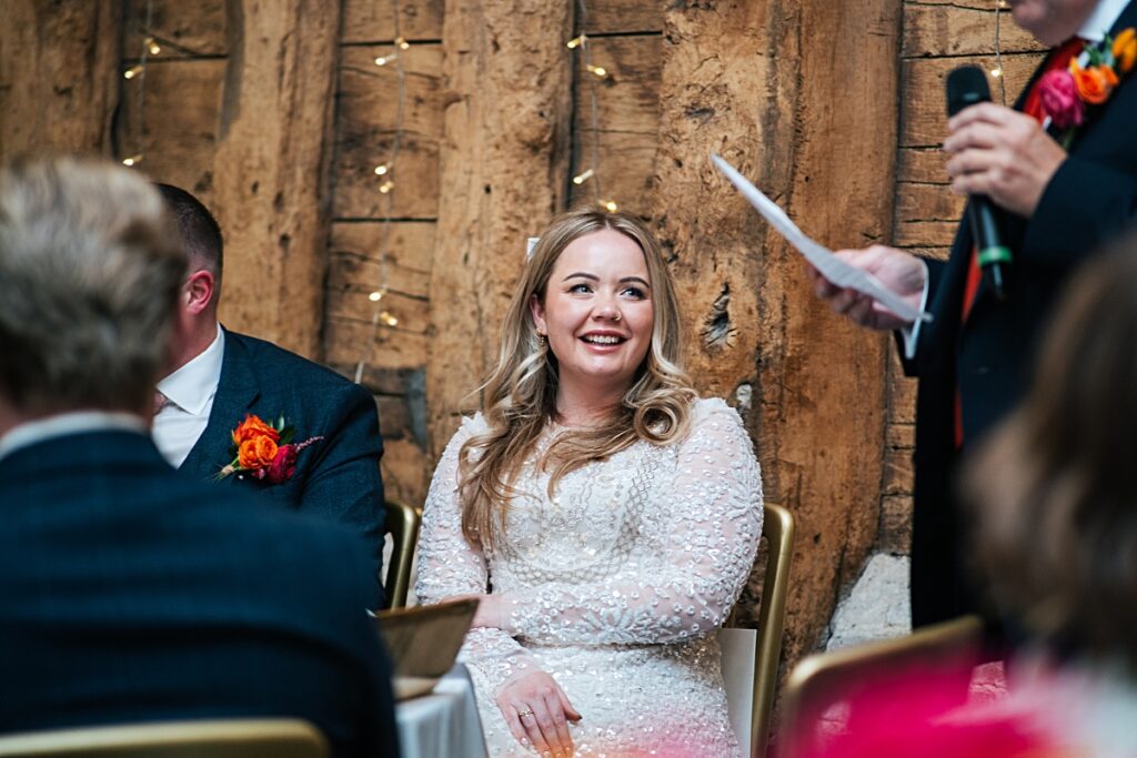 hot pink, orange and disco balls for autumn wedding at Blake Hall