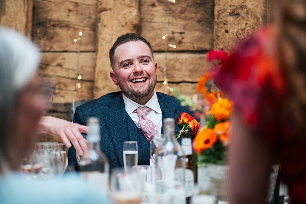 hot pink, orange and disco balls for autumn wedding at Blake Hall
