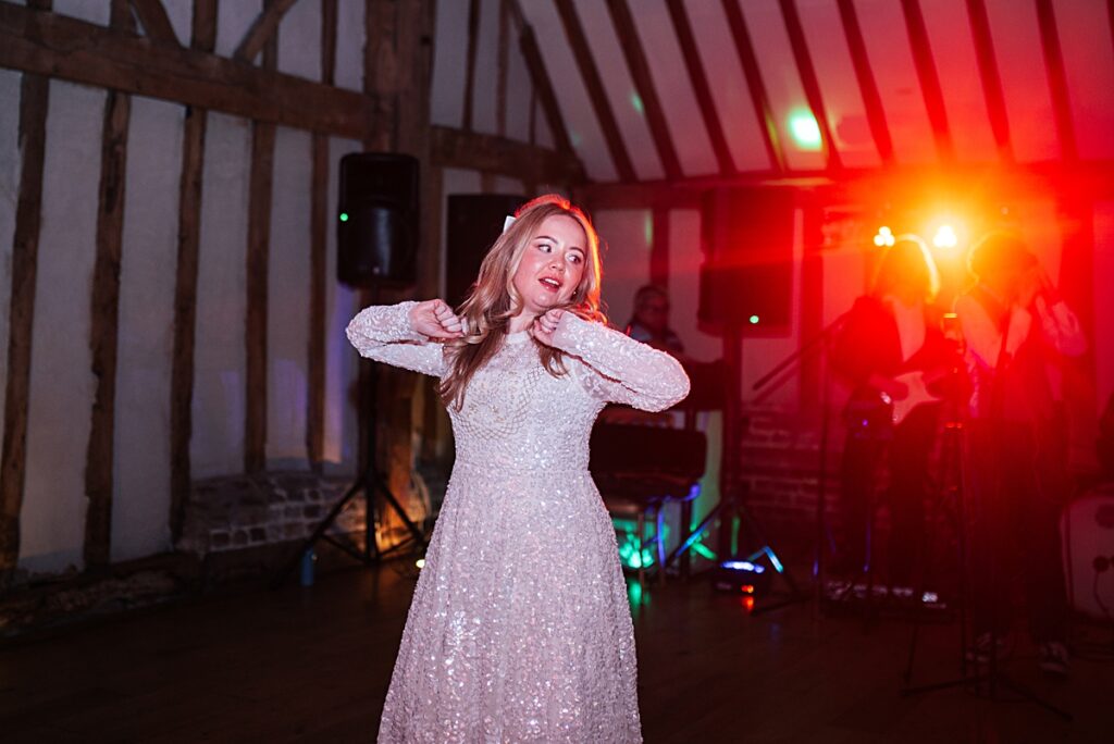 hot pink, orange and disco balls for autumn wedding at Blake Hall