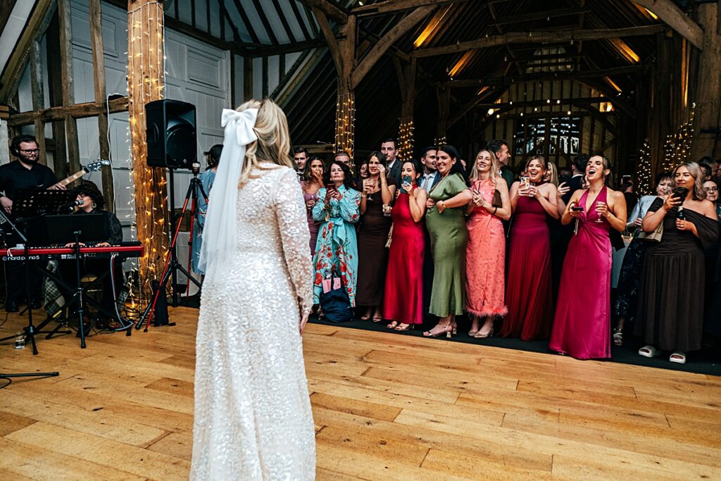hot pink, orange and disco balls for autumn wedding at Blake Hall