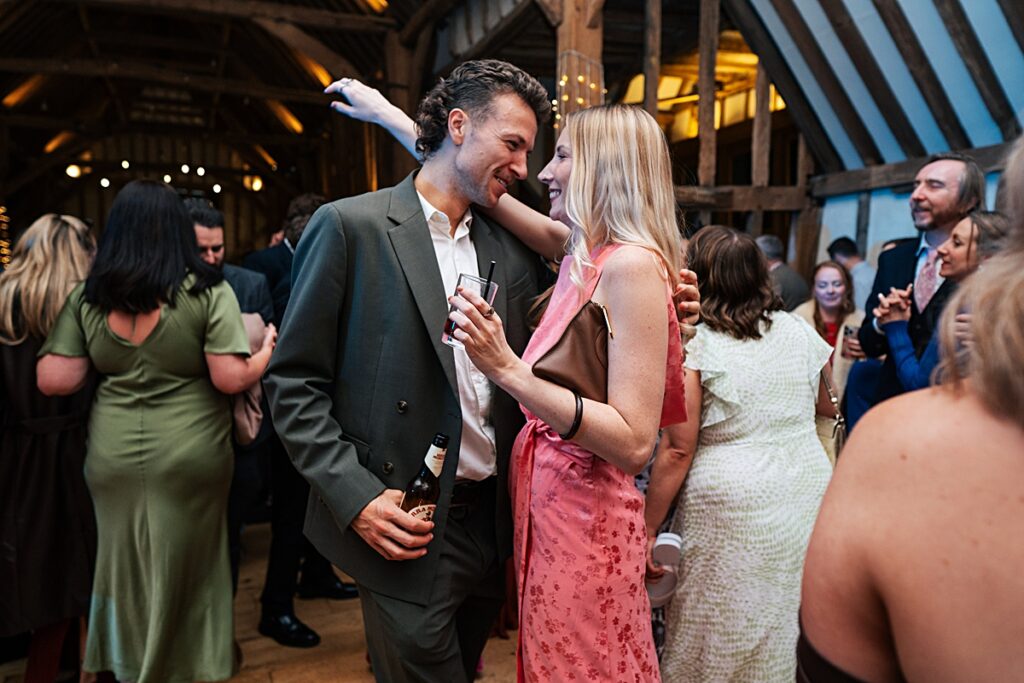 hot pink, orange and disco balls for autumn wedding at Blake Hall