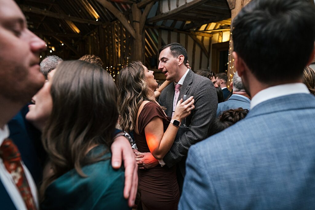hot pink, orange and disco balls for autumn wedding at Blake Hall